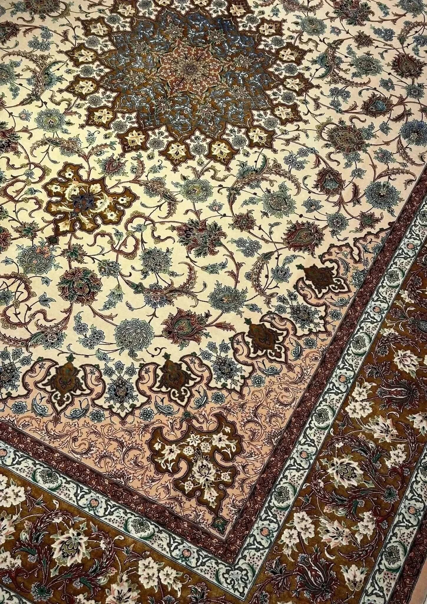 "Hand-knotted Persian rug from Isfahan featuring a traditional 8x10 design with wool and silk blend for a luxury home look."